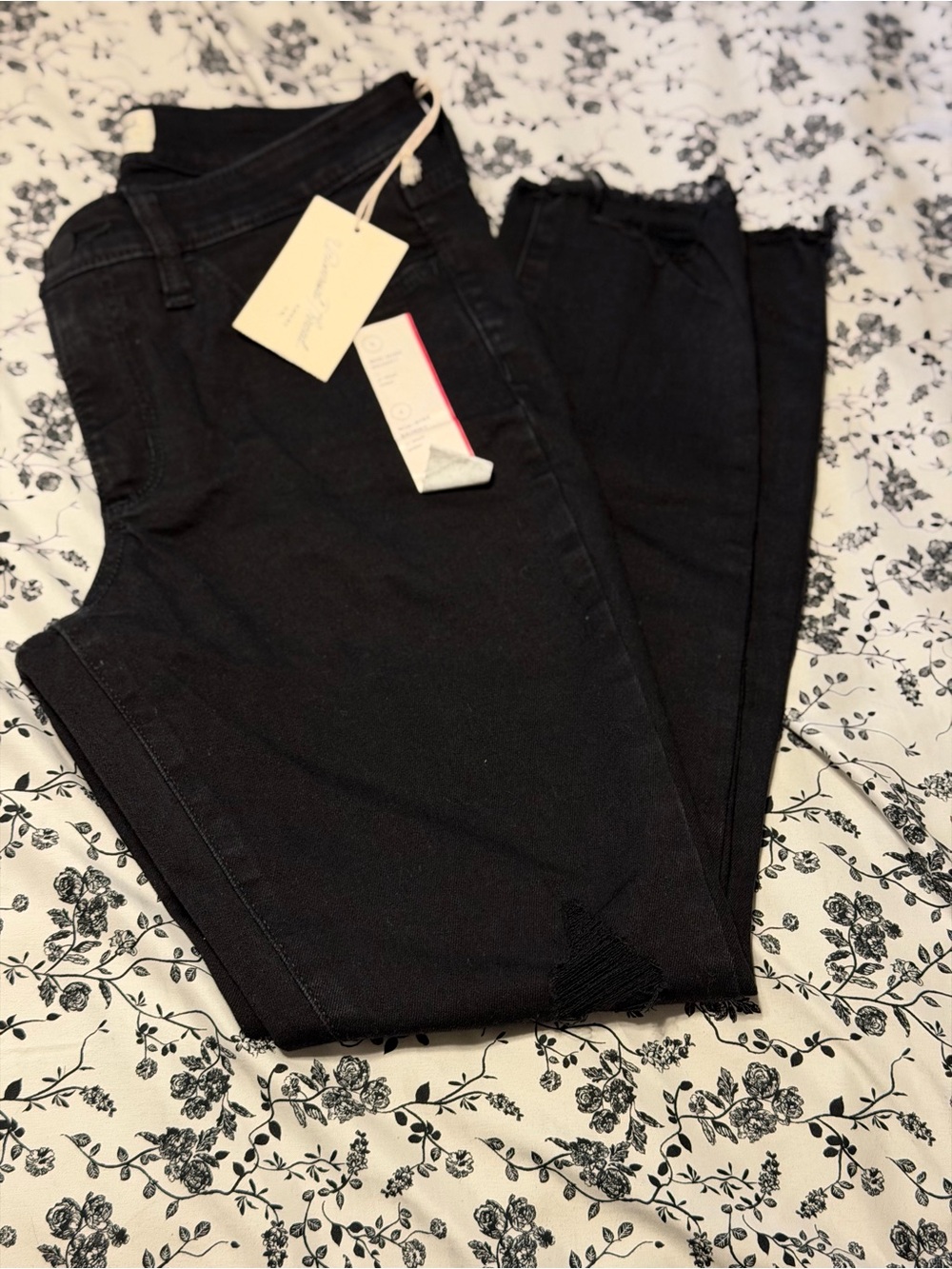 Black Mid-Rise Women's Jeans size 4 with Raw Hem